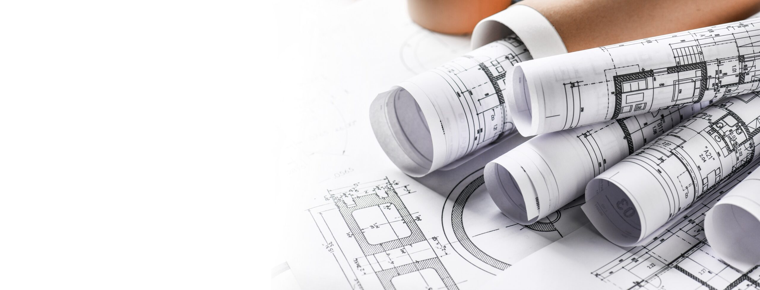 Technical drawings with measure tools. Pencil, measurement. Papers with technical drawings and diagrams on the table.

C