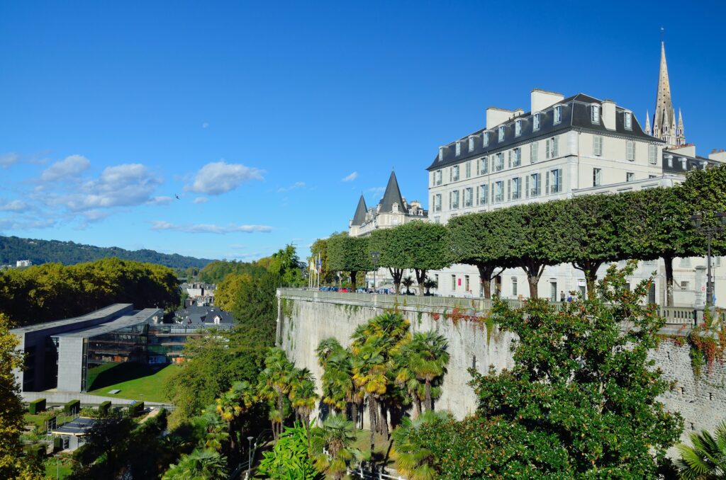 There are edifices, an alley of the topiary trees and a public garden in the Boulevard of Pyrenees.