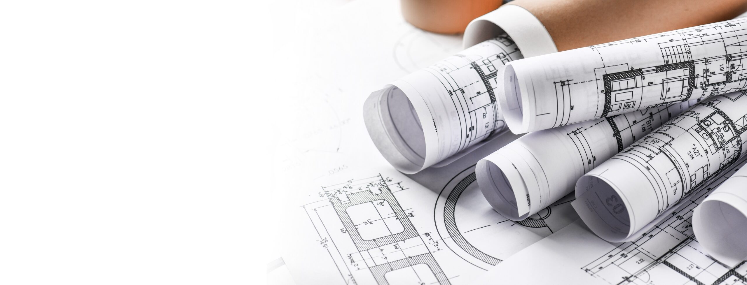 Technical drawings with measure tools. Pencil, measurement. Papers with technical drawings and diagrams on the table.
C